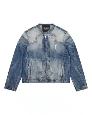 The Trapstar x Ed Hardy Denim Jacket in classic blue showcases unique artwork and a modern silhouette, blending timeless denim with bold streetwear style.